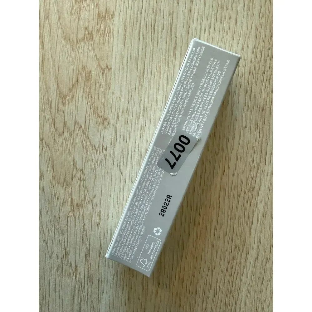 $23 New REM Beauty Upmost Importance Plumping Gloss - 15mL